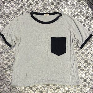 Selling: Light blue with dark blue pocket and lining, t-shirt. Size small.